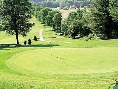 This photo of the 4th hole at the Twin Village golf course shows the original tee, green and fairway.