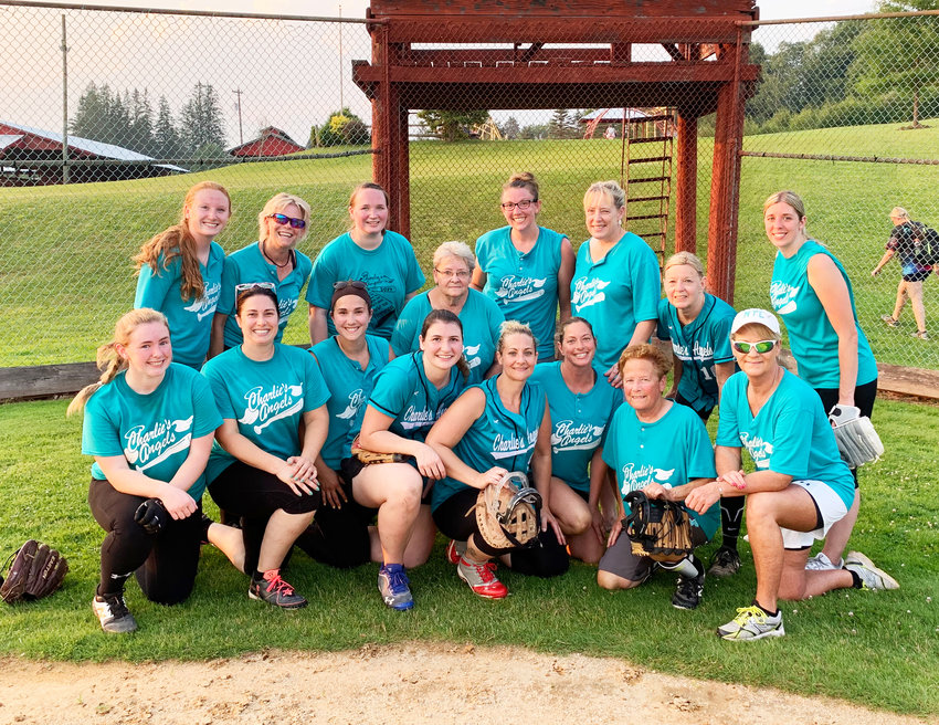 Charlie&rsquo;s Angels smile in celebration at home plate after claiming victory over D&amp;D Contracting 19-9.