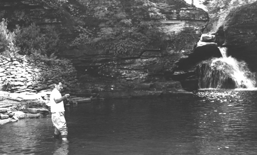 Irving Berlin fishing near his home in Lew Beach.