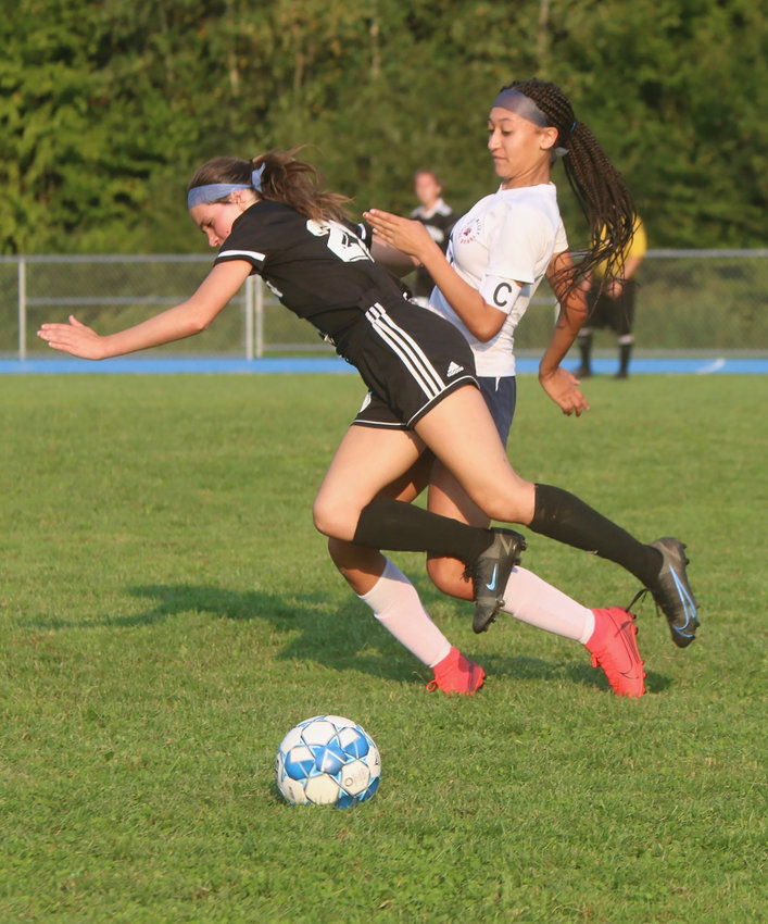 Sullivan West&rsquo;s Grace Boyd and Tri-Valley&rsquo;s Kendall McGregor vie for a ball in midfield. Both are extremely agile and skillful players. Boyd scored two of her team&rsquo;s six goals, while McGregor scored the lone goal for the Lady Bears.