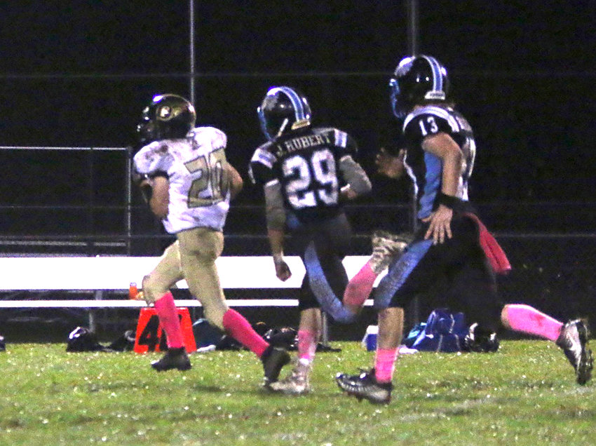 Fallsburg freshman Nick Storms gallops towards the endzone behind a 79-yard pass play from quarterback Isaiah Young late in the game to help the Comets avoid the shutout.