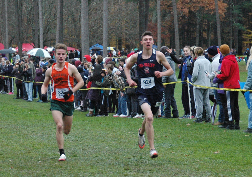 Adam Furman finished second in the Class D boys race. He led until the final 100 meters before being overtaken by Colten Kempney, left, a senior from Beaver River.