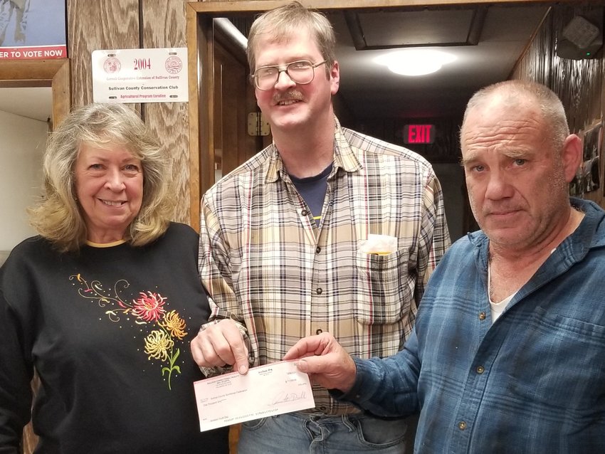 On December 8, 2021, Mark Puerschner presented a $1,000.00 check to the Sullivan County Federation of Sportsmen from the Correctional Officers and staff of the Sullivan County Correctional Facility Maximum Security Prison. The contribution is earmarked for the annual Kay Danchak Memorial Outdoor Youth Expo that is held each September. Next year's youth event is scheduled to be held on September 10, 2022 at the Grahamsville Fair Grounds. Mark was the Federation's 2020 Sportsman of the year. From left to right, Linda Loughery, Foundation Treasurer, Federation President John VanEtten and Mark Puerschner.