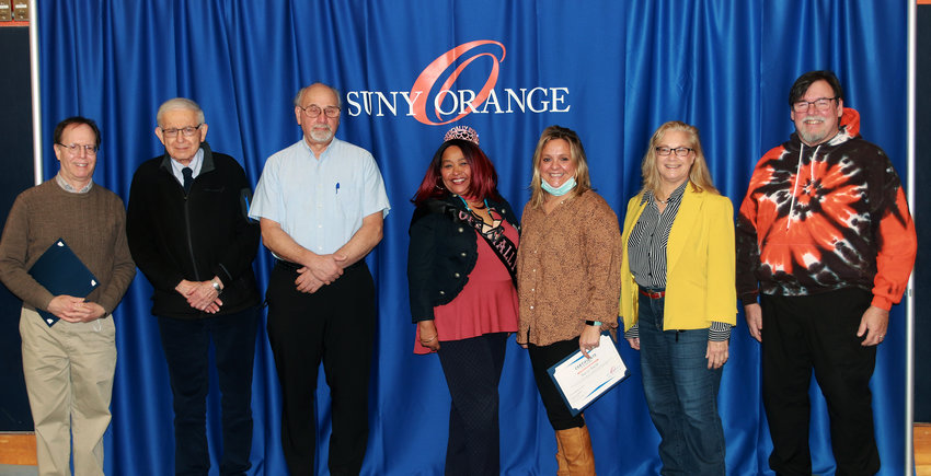 Among the 42 retirees recently recognized for their service to SUNY Orange were a group of employees who worked at the College for more than 30 years. Among those in the &ldquo;Over 30 Club&rdquo; were, from left, Mark Strunsky, arts and communications professor; Steve Winter, business professor; Peter Cutty academic advisor; Lori Charitable, human resources; Stacey Smith, student services; Barbara Fiorello, business professor; and Art Ramos, information technology services.