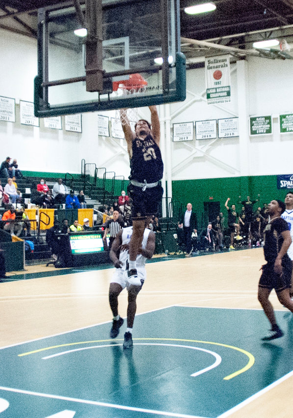 Sophomore guard Jay Alvarez rises up for a dunk in the Generals&rsquo; victory over Montgomery College.