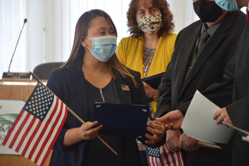 Yenny Johanna Lozano Animero smiles as she becomes a citizen.
