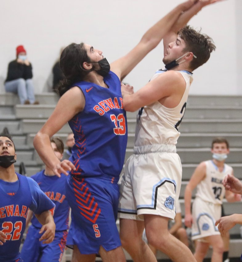 SW&rsquo;s Dylan Sager came up big in the fourth quarter scoring all 12 of his points. Here he rises up and draws a foul from Seward&rsquo;s Cole Buchalski.