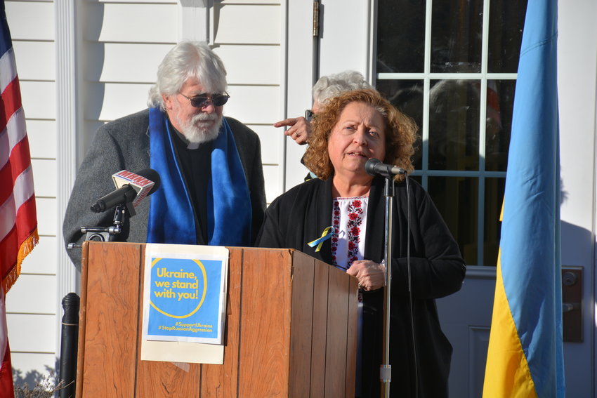 District 2 Legislator Nadia Rajsz, who is a member of the Ukrainian Congress Committee of America and president of the local branch of the Ukrainian National Women&rsquo;s League of America, speaks to rally attendees. To her left is Pastor Bob Everett.