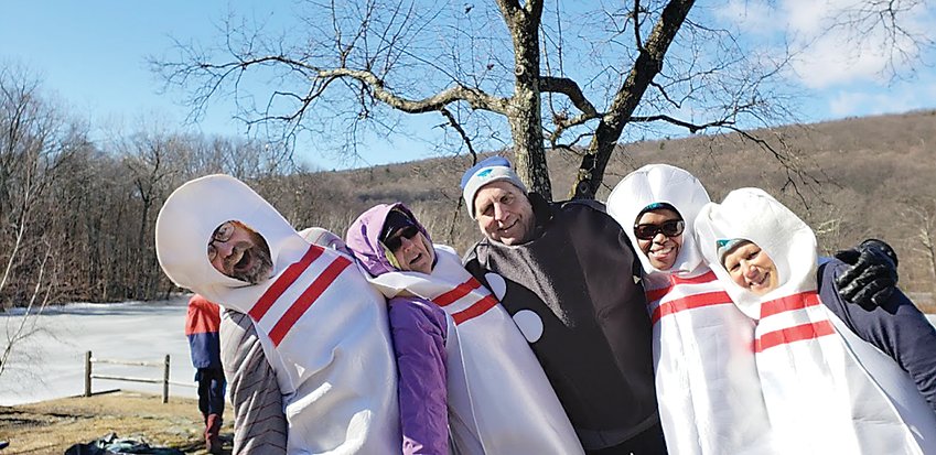 Team Strike Out Alz from a previous year&rsquo;s plunge included (from left) Kyle Giordano, Marcia Fink, Terry Grafmuller, Joan Patterson, Theresa Grafmuller.