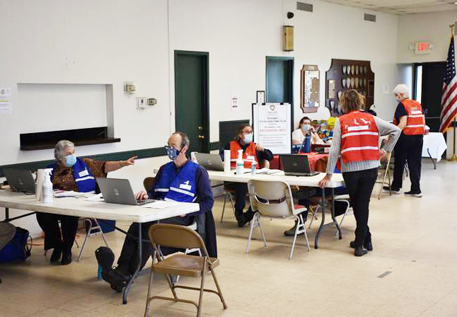 Medical Reserve Corps volunteers worked side-by-side with Public Health Services staff during dozens of COVID-19 vaccination clinics, including this one at the Stroebele Center in Monticello.