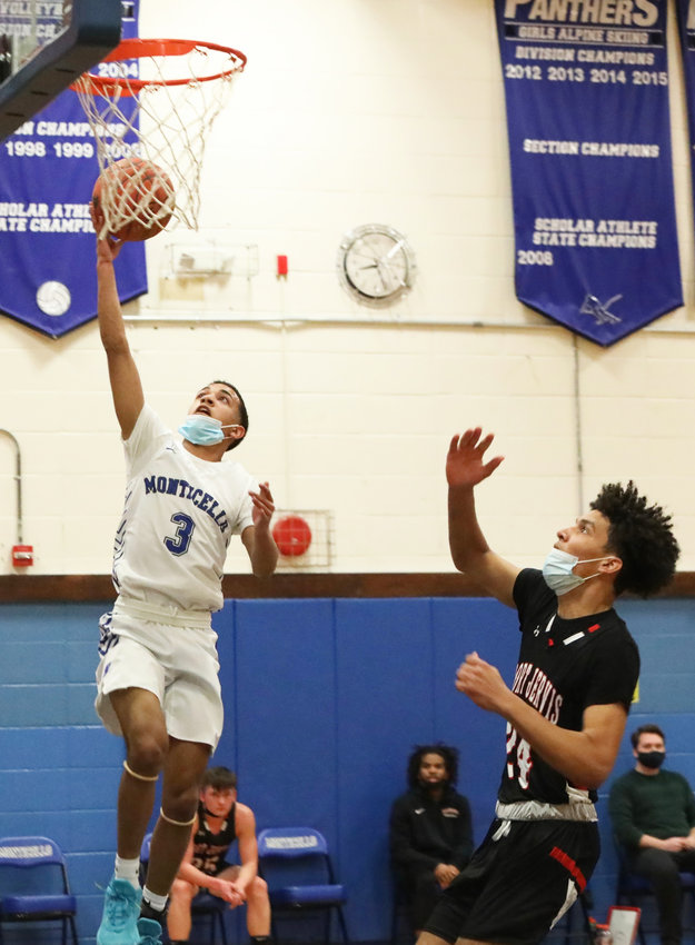Pedro Rodriguez elevates for two points on senior night versus Port Jervis.