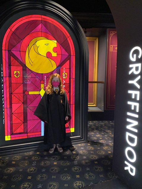 Adeline was dressed in her Gryffindor robe and ready to arrive at Hogwarts.