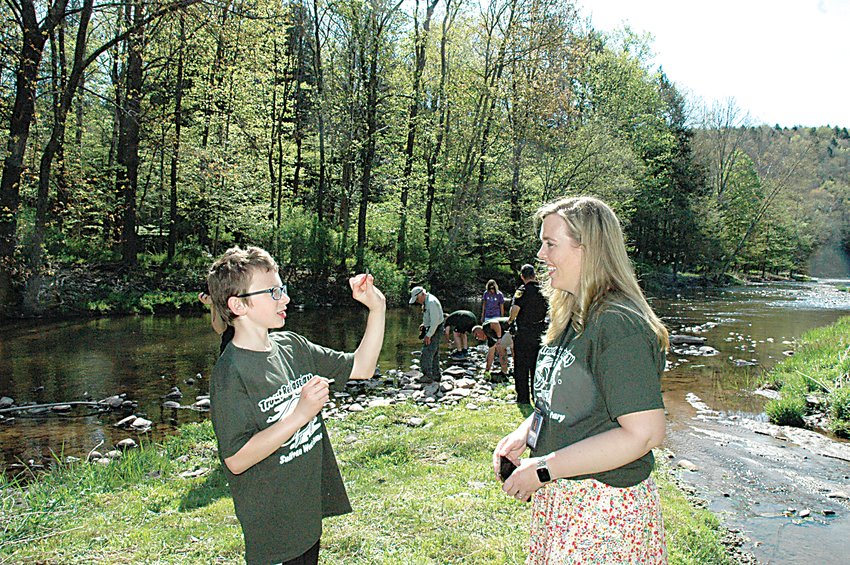 Dr. Kathleen Bressler with a Sullivan West student at the district&rsquo;s recent Trout Release Day.