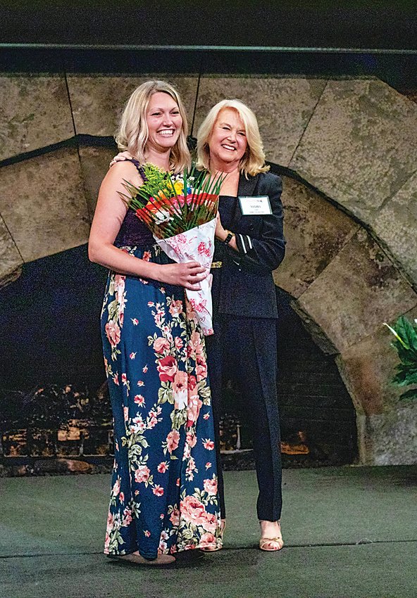 The Healthier Generations Advisor of the Year award given to Kayla O&rsquo;Dell from Sullivan West Elementary for her numerous efforts to bring health and wellness opportunities to her students. She is being congratulated by Sandra Gerry founder of Sullivan Renaissance.