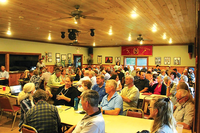 A large crowd of people filed into two rooms at the Claryville Firehouse on Tuesday night for an informational meeting about the proposed Kerilands project in the Town of Neversink.