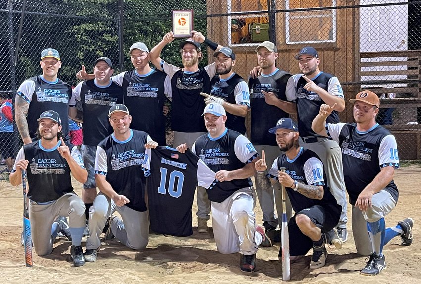 The championship Darder Stone Works team are the 2022 champions of the Rock Hill Modified Softball League. Team members kneeling left to right include Justin Diehl, Steve Musso, (the Corey Hornicek jersey) Mark Tesseyman, Weslie Olivio and Derek Blume. Standing left to right, Austin Sauer, Chris Orlando, Eric Leewe, Mike  Mills, Richard Shevak, Lucas Bauer and Rodney T. Jester. Missing from this photo is Austin Delaney who was out of town on vacation.