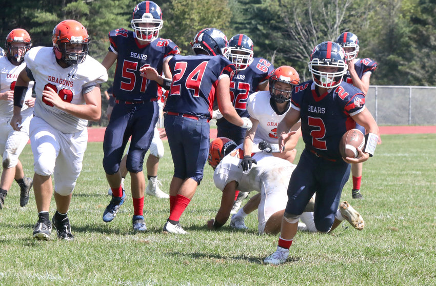 T-V senior quarterback Austin Hartman is back with a vengeance from last year&rsquo;s season-ending injury. Here he scores one of his three TDs on the day as the Bears extinguish the Dover Dragons&rsquo; fire en route to a 21-0 non-league win.