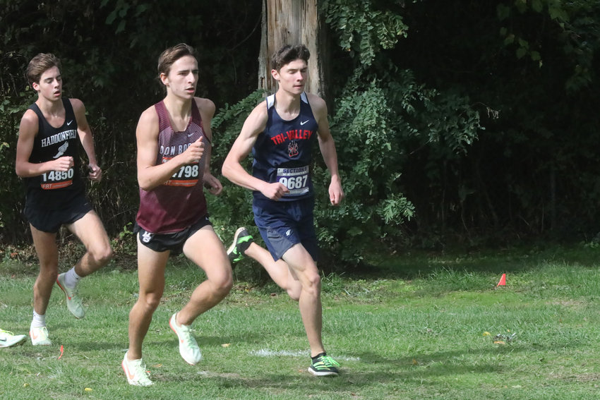 Tri-Valley&rsquo;s Adam Furman leads Paul McGuire of Don Bosco Prep and George Andrus of Haddonfield Memorial H.S. in the early going. Furman went on to edge Andrus in a photo finish to capture his third Invitational title this fall.