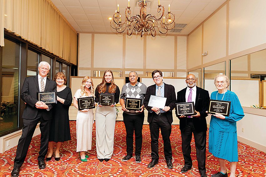Pride Awardees, from the left, Glenn and Pat Smith, Lindsay Wheat, Shannon Cilento, Matthew Carrero, Joseph Abraham, Pedro Tweed and Marilyn Lusker.