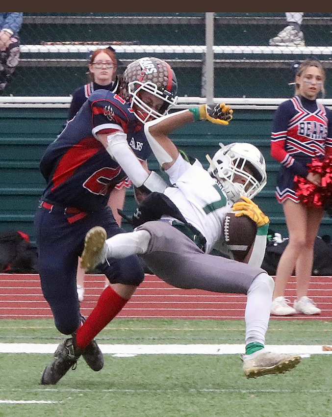 Tri-Valley senior Ian Mullen upends Spackenkill wide receiver Josh Lewis. Mullen was a beast on both sides of the ball making great tackles and scoring two TD&rsquo;s.