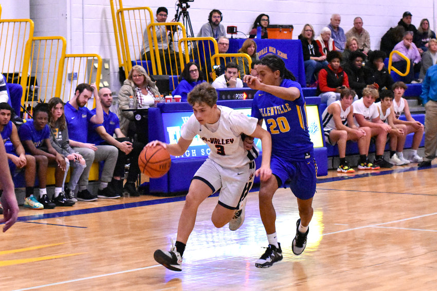Tri-Valley&rsquo;s Misha Khodakovski drives to the basket against an Ellenville defender. Ellenville took home the victory with a 67-40 final score.
