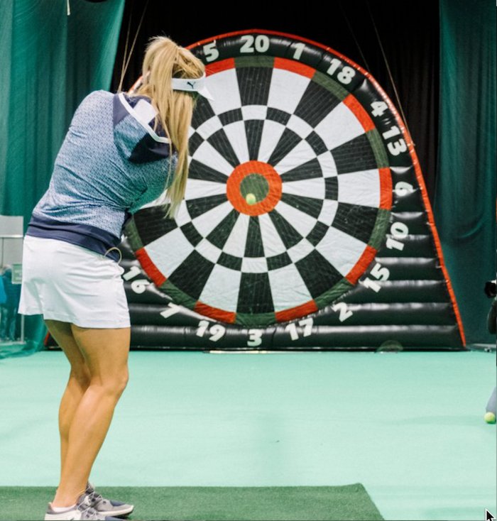 One of the interesting challenges at the golf show is the game called Golf Darts. The object is to chip three velcro golf balls onto the dart board.....a prize will be awarded to each contestant that surpasses a determined point total with the overall weekend point leader winning a grand prize.