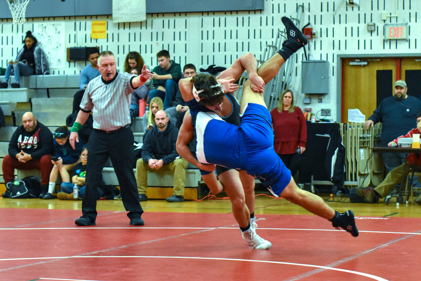 ESW&rsquo;s Rally Cruz uses a single leg takedown to force Monticello&rsquo;s Arturo Benedicto to the mat.