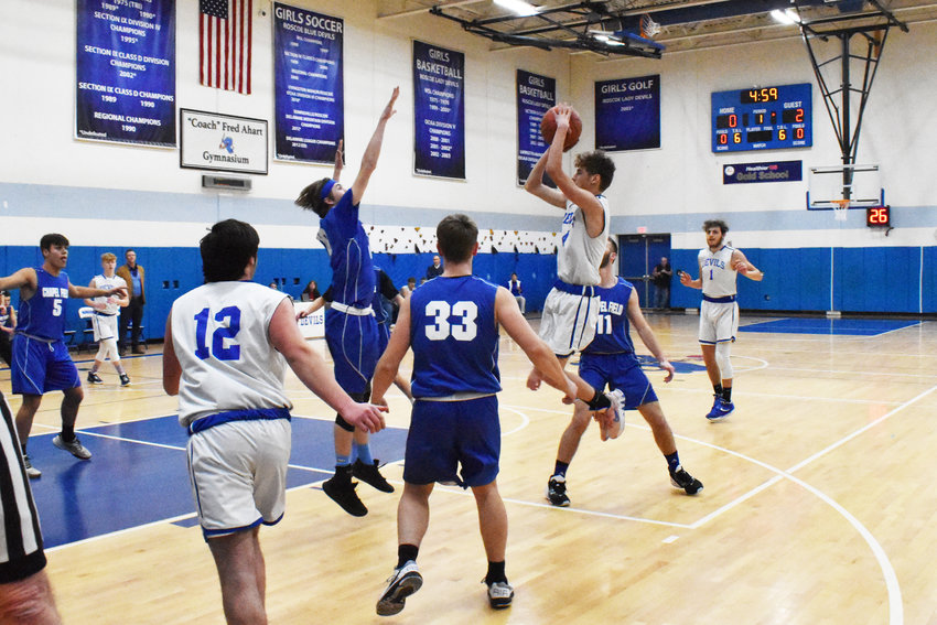 Anthony Zamenick lifts up for a jump shot early in the game against Chapel Field. Zamenick had 11 points in the loss.