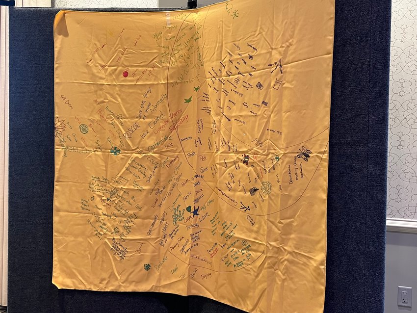 Decorated tablecloths from last year&rsquo;s Youth Summit were on display.