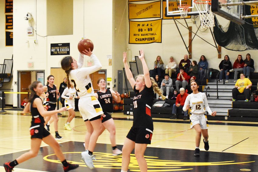 Ashley Ingrassia led all scorers with 14 points in the league win over Liberty.