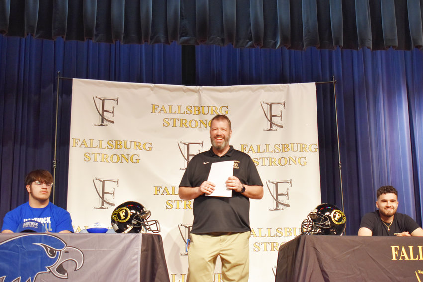 Coach Dom Scanna is all smiles as he introduces the two future college football players graduating from Fallsburg this year.
