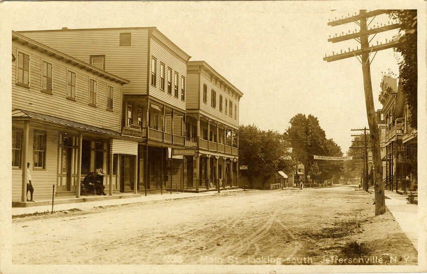Time machine:    Buildings which survived the fire of 1918 on Main Street in Jeffersonville are few. At least two of these buildings still remain. Lixfield&rsquo;s offered Ballantine&rsquo;s Beers &amp; Ales at the left. A notice in the Sullivan County Record in 1911 said, &ldquo;Wm. H. Lixfield is remodeling the interior of his building, formerly the Baum place, so that the cafe floor will be up with the street level. George C. Lixfield has moved his harness business to the Beck building across the street.&rdquo; A confectionery and the Knell &amp; Durr Caf&eacute; were also renovated at some point, enclosing the balconies you see here. Another sweets and ice cream shop sign is visible down the street. The Eagle Hotel street banner proclaims &ldquo;Automobile parties accommodated - oil and gasoline for sale - garage and livery - ice cream.&rdquo;