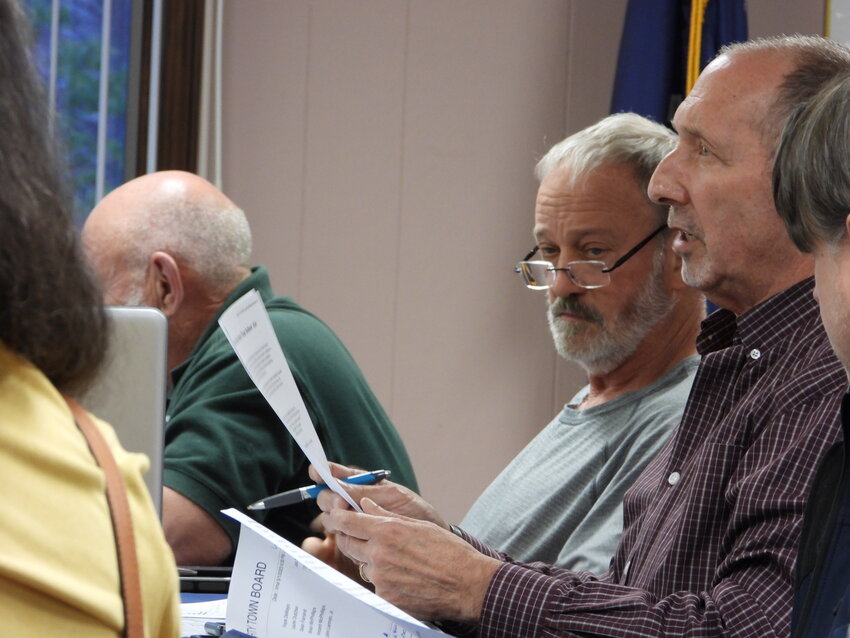 Town of Liberty Supervisor Frank DeMayo, right, and Councilman Dean Farrand, discuss the proposed zoning changes presented by Town Planner Peter Manning.