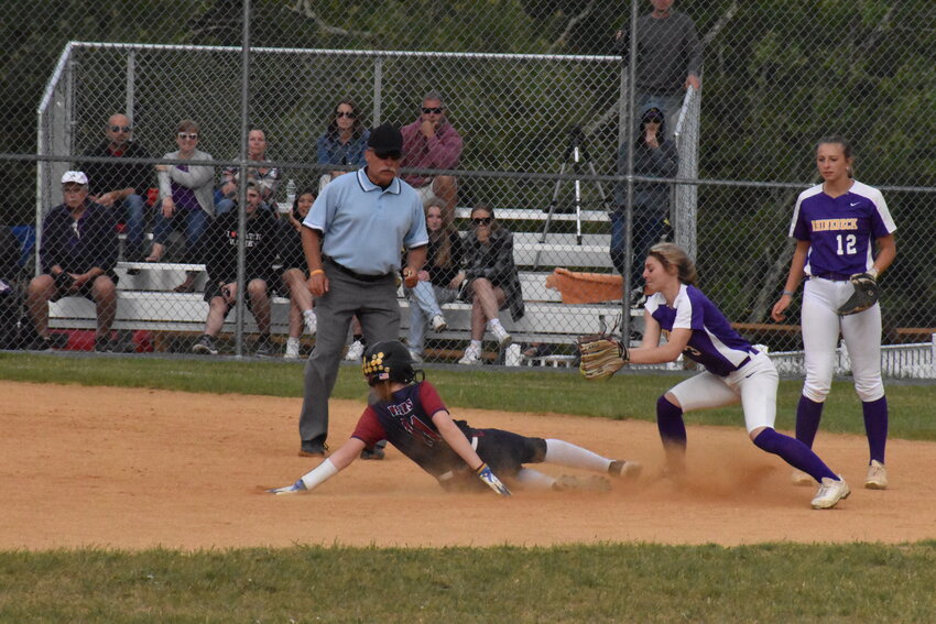 Kaitlin Stungis slides safely into second base before scoring in the sixth inning.