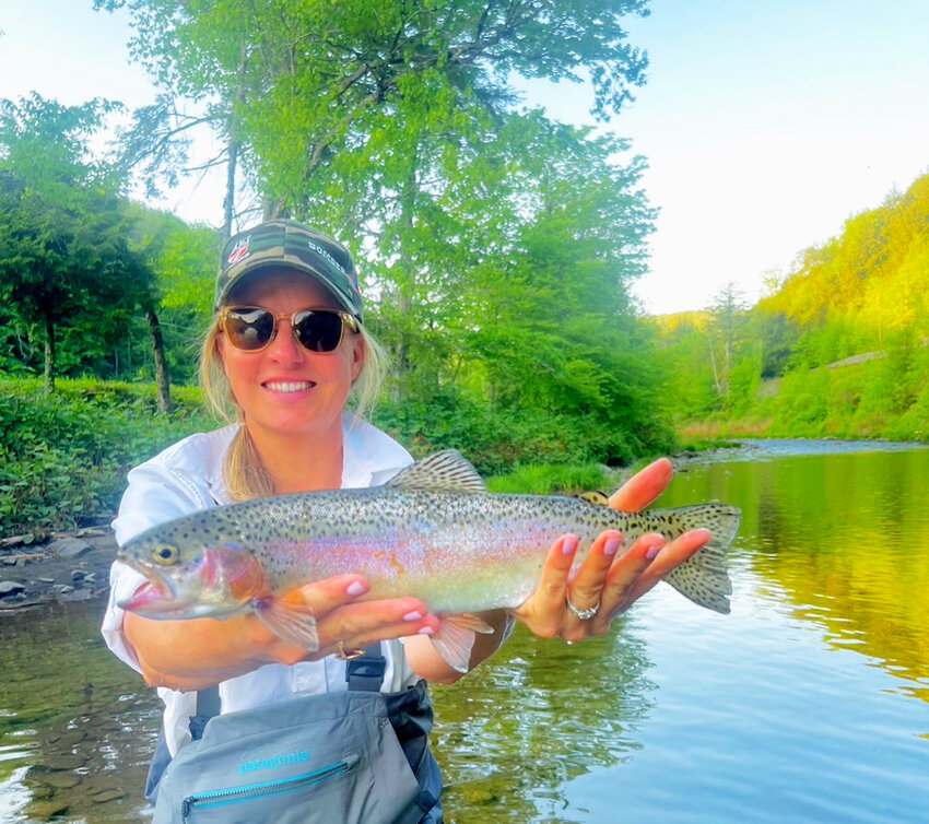 Sandra did well fishing on the Beaverkill with her husband one evening last weekend during a spinner fall, and caught this beautiful rainbow trout on a Rusty Spinner.