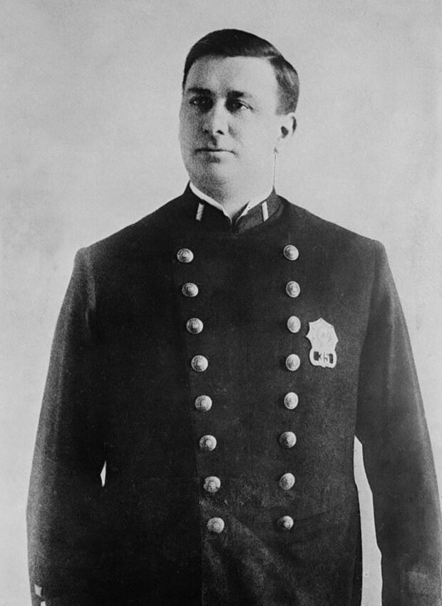 Charles E. Becker as a NYC police officer.