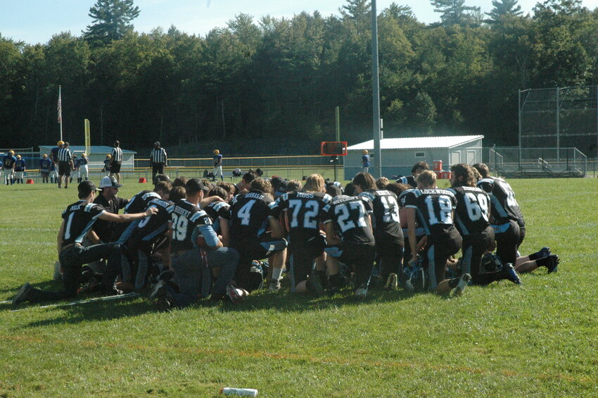 The 2023-24 Sullivan  West Bulldogs football team huddles up prior to hosting a scrimmage at their field in Lake Huntington on Saturday, September 2.