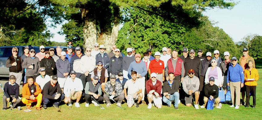 The golfers in the 8th Annual CHCM Golf Outing take a break for a group photo.