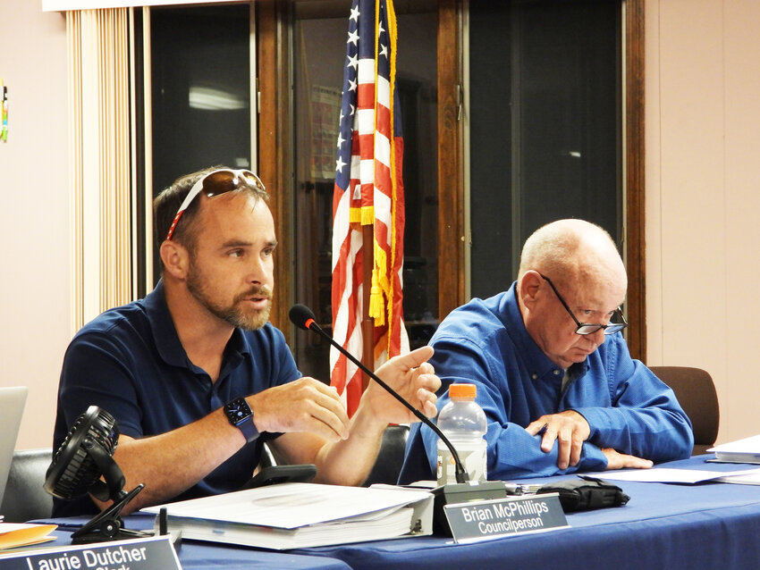 Liberty Town Board member Brian McPhillips, left, voiced his request to review the Planned Unit Development (PUD) Zoning Code language, Section 147-23, as a condition to be written into an anticipated resolution regarding the Lake Hills Estate PUD project. The resolution, if passed, would have the project proceed before the Town Planning Board for further discussion. Councilman Vince McPhillips is at right.