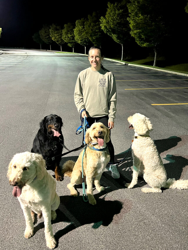 One of my favorite forms of active recovery is going for a walk with my husband and our four dogs.