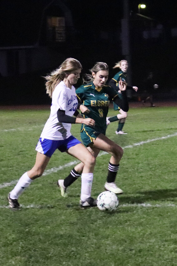 Eldred&rsquo;s Rayanna Quintana and a Chapel Field defender sidle the edge of the field for possession of the ball.