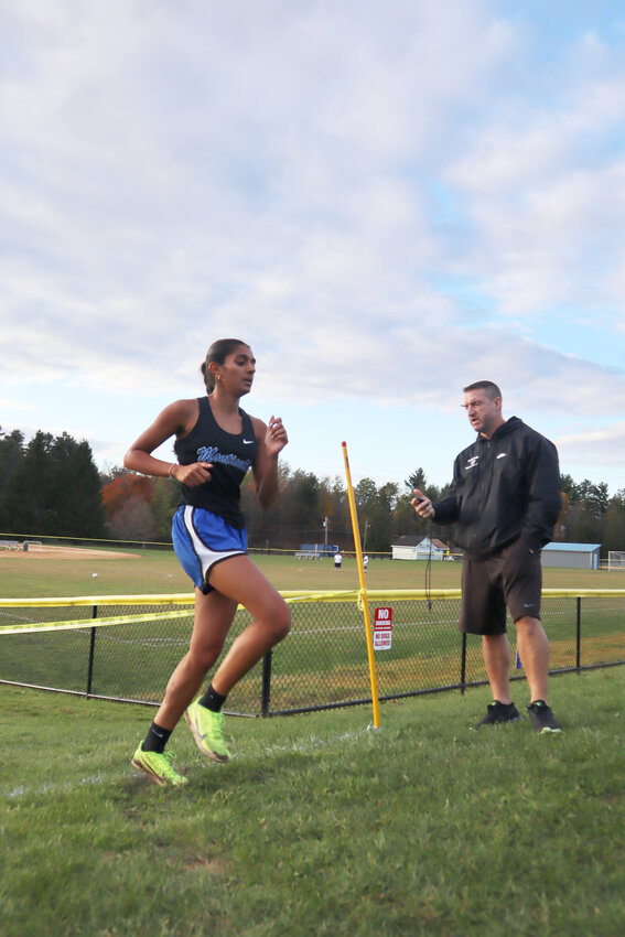 Diya Patel crosses the finish line with a time of 16 minutes and 13 seconds with a nearly minute lead on the rest of her competitors.