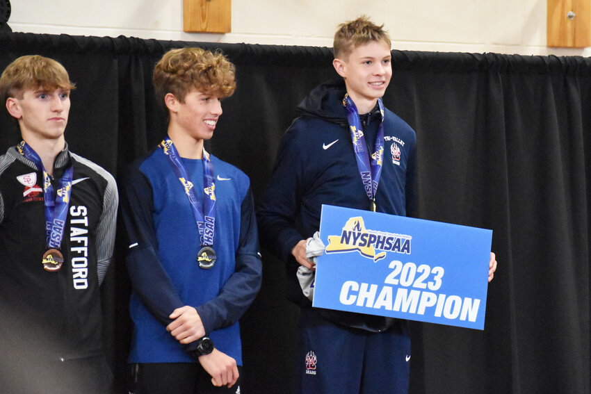 Van Furman shows off his 2023 Champion sign after taking first place in Class D. Furman finished third overall in the merged results from all four races.