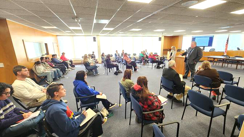Sullivan West students listen to Sullivan County Treasurer Nancy Buck and Deputy County Attorney Tom Cawley talk about their roles in County government during the first of a series of Youth Bureau-organized visits to the Government Center in Monticello.