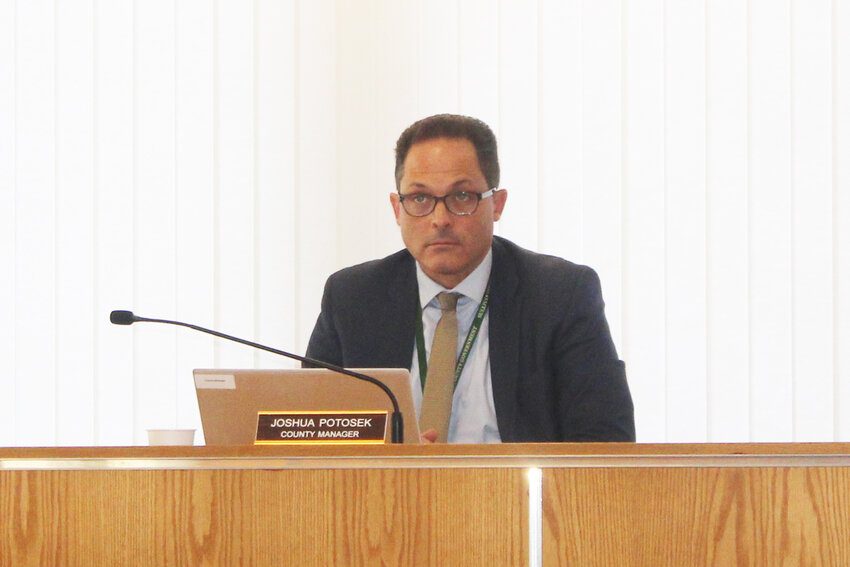 County Manager Joshua Potosek at the Legislature meeting on Thursday, December 14, in which the 2024 County Budget was adopted.