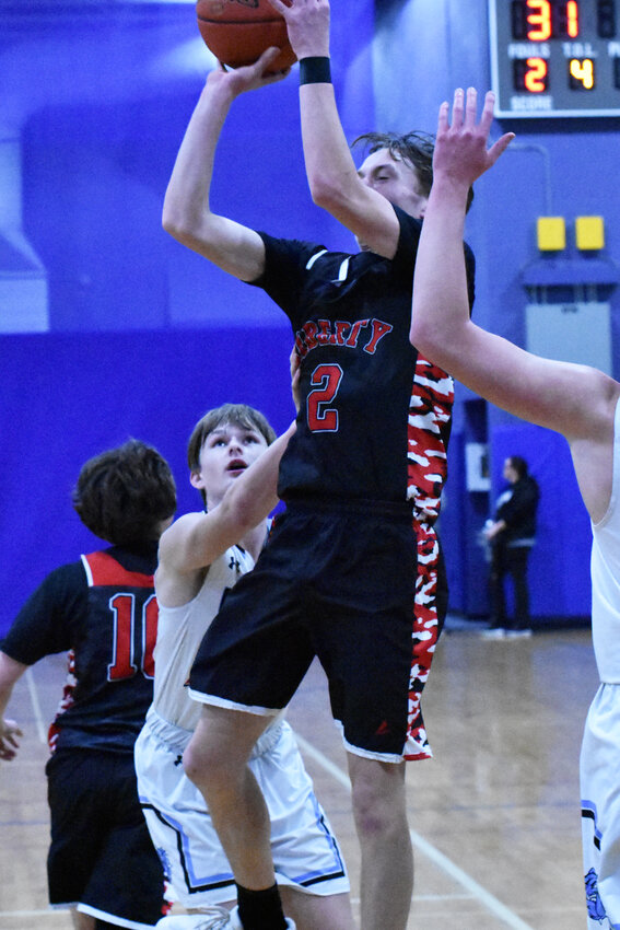 Liberty&rsquo;s Riley Totten shoots and scores on a mid-range jumper. The RedHawks&rsquo; guard finished with a game-high 29 points as Liberty defeated Sullivan West on Wednesday night.