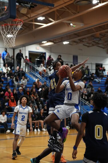Christian Brown scores a go-ahead bucket to reach the 30-point mark in a thrilling overtime win over Beacon.