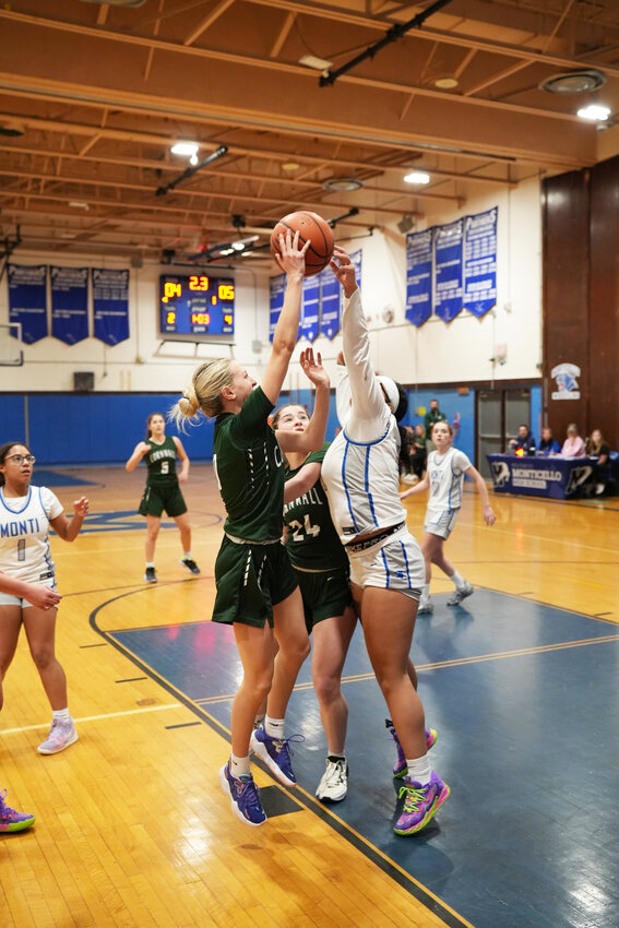 Amiah Neails ended the first quarter with one of her three blocks as she rejects Cornwall&rsquo;s Emma Shapiro in last Friday&rsquo;s 37-14 loss.