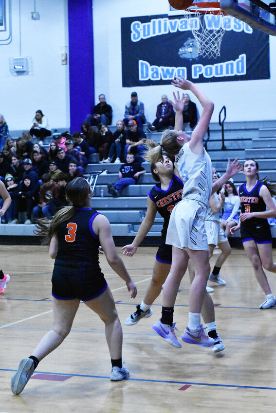 Sullivan West&rsquo;s Ella Herbert goes for an open layup after a hard drive to the basket.