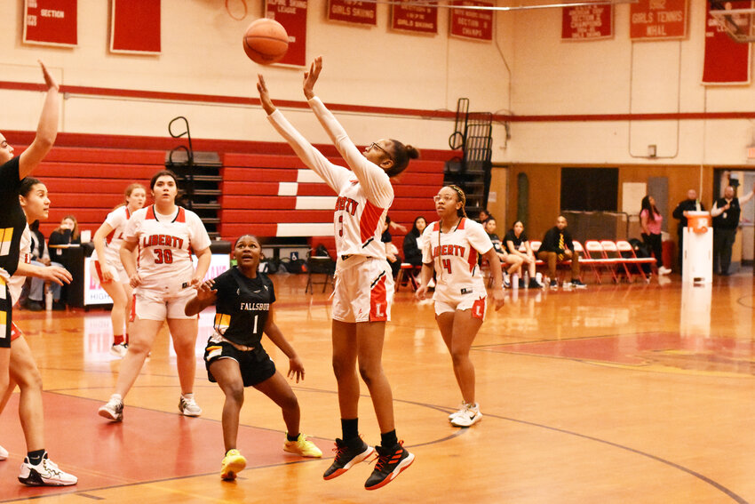 Liberty&rsquo;s Destiny Loyce takes an open jump shot, Loyce was the top scorer of the night with 16 points.